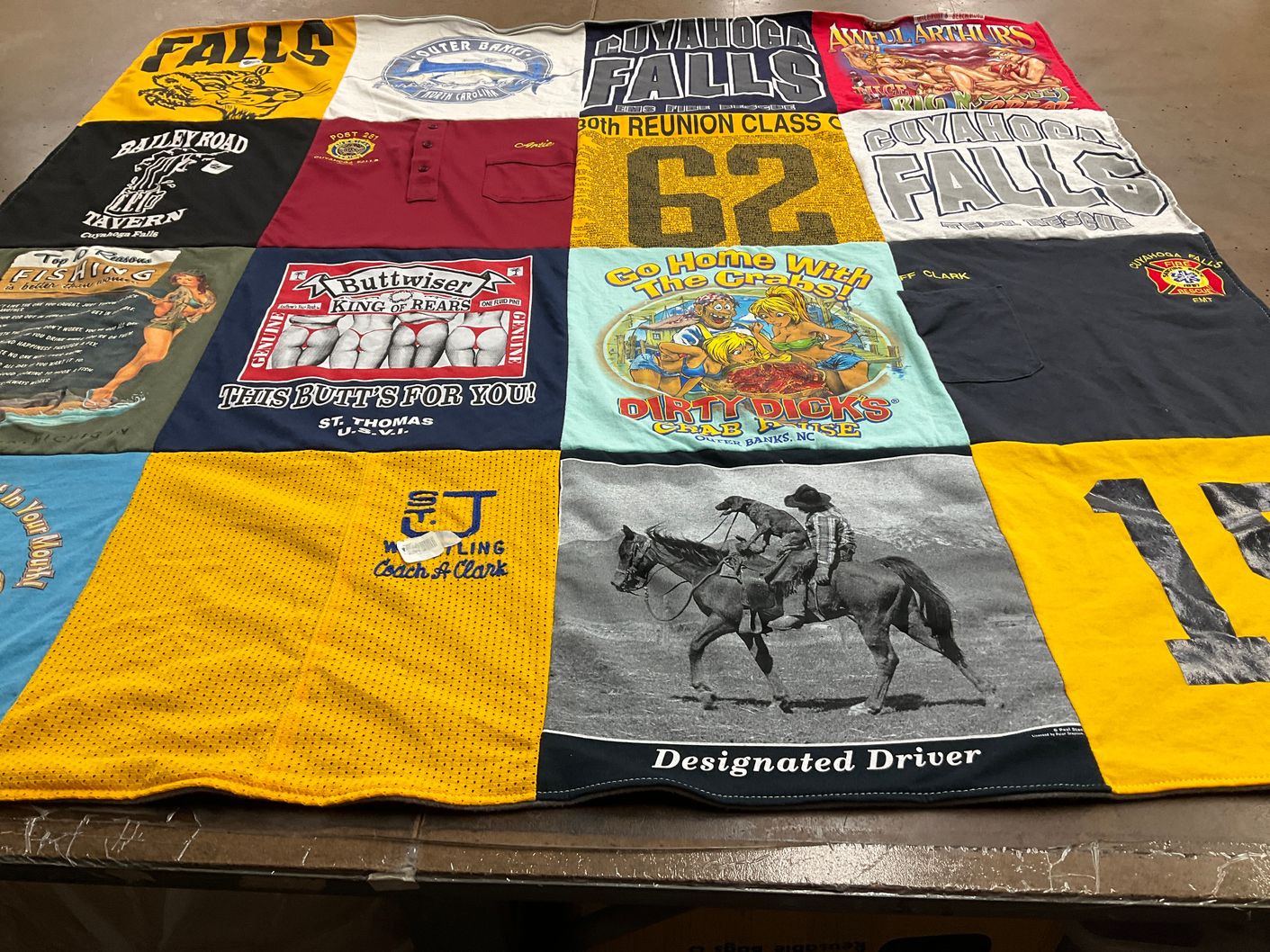 T-shirt quilt with fishing, wrestling themes by Ashley from OH
