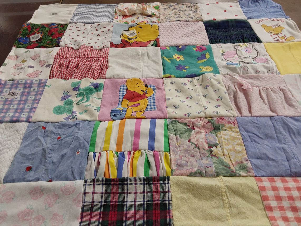 T-shirt quilt with children's characters, cartoons themes by Angela from PA