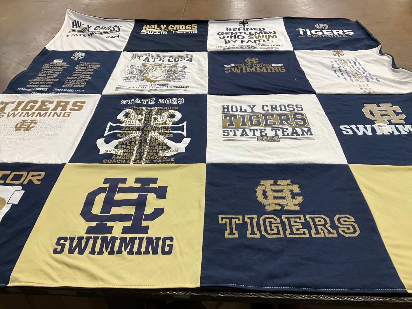 T-shirt quilt featuring holy cross tigers swimming by Julie from LA