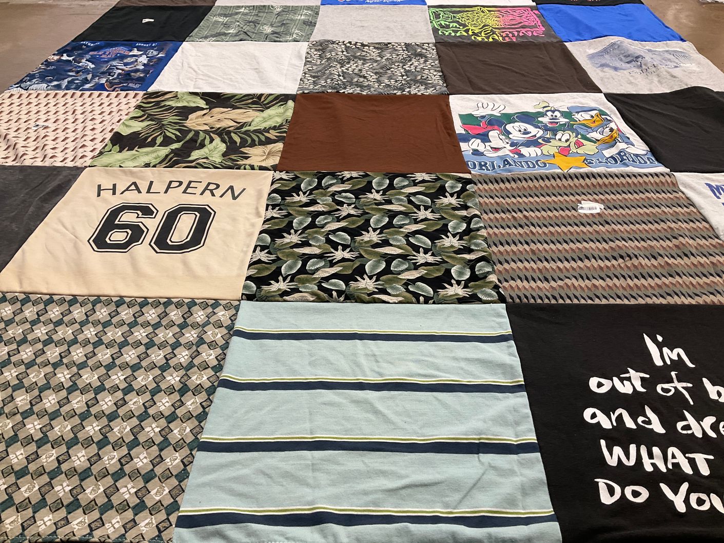 T-shirt quilt with disney, travel themes by Paige from NY