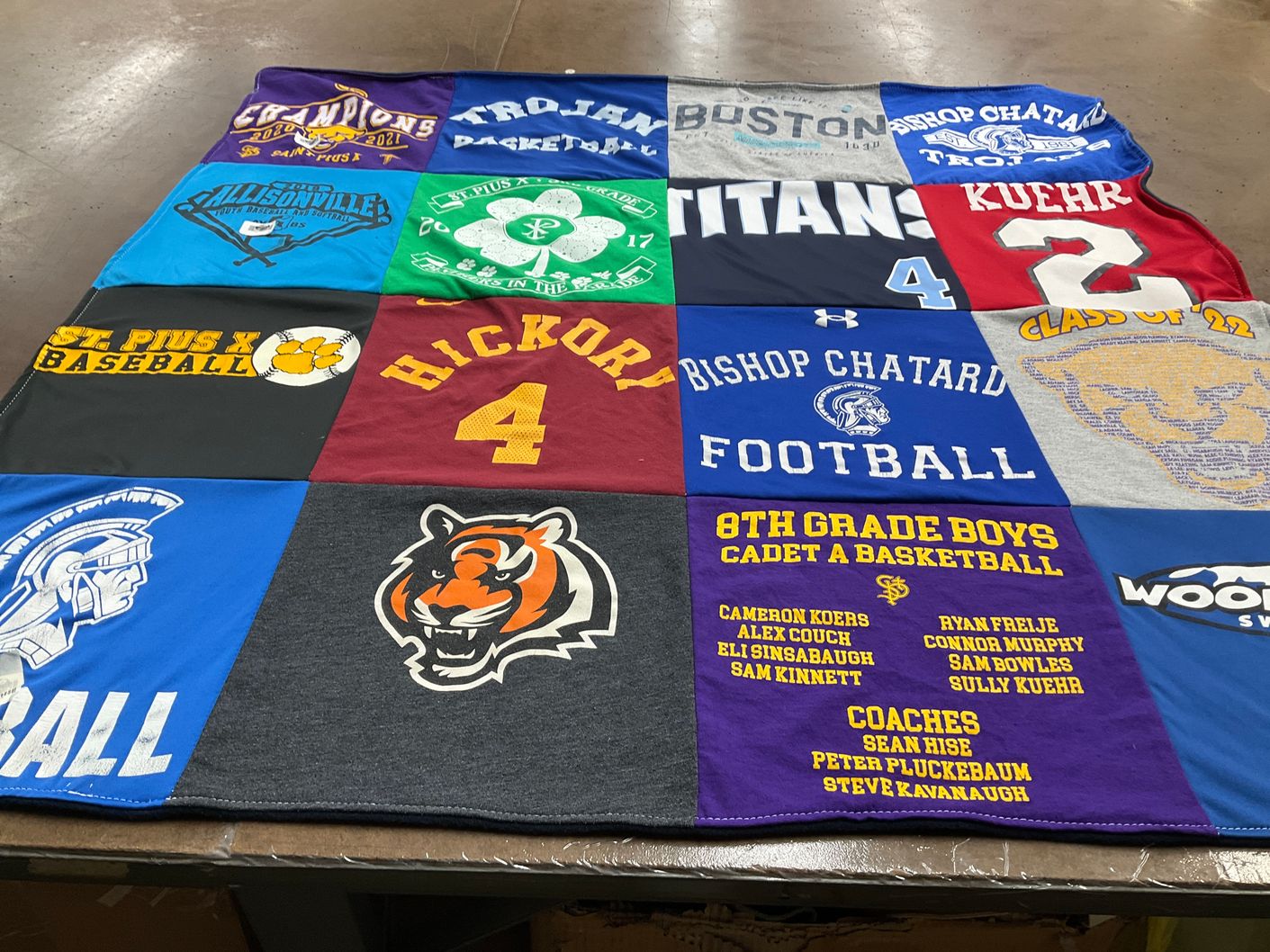 T-shirt quilt featuring hickory football team, trojan basketball team by Colleen from IN