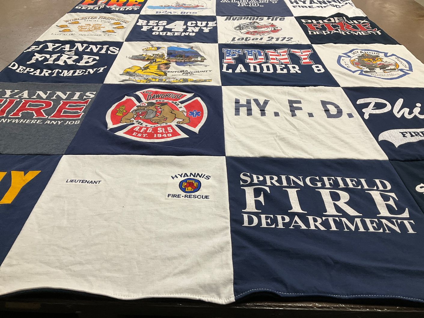 T-shirt quilt with firefighting, community service themes by Robert from MA