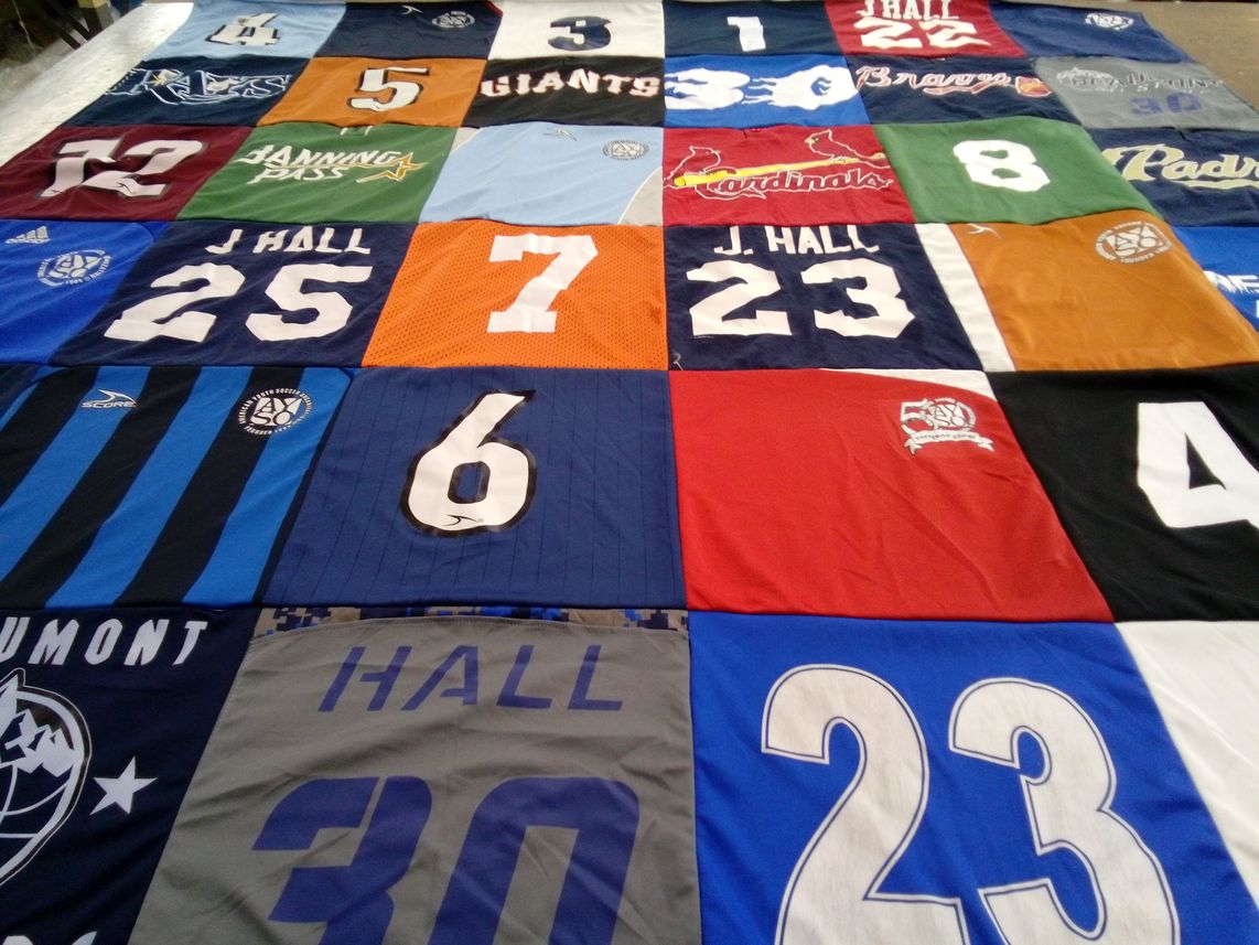 T-shirt quilt with sports themes by Kenneth from CA
