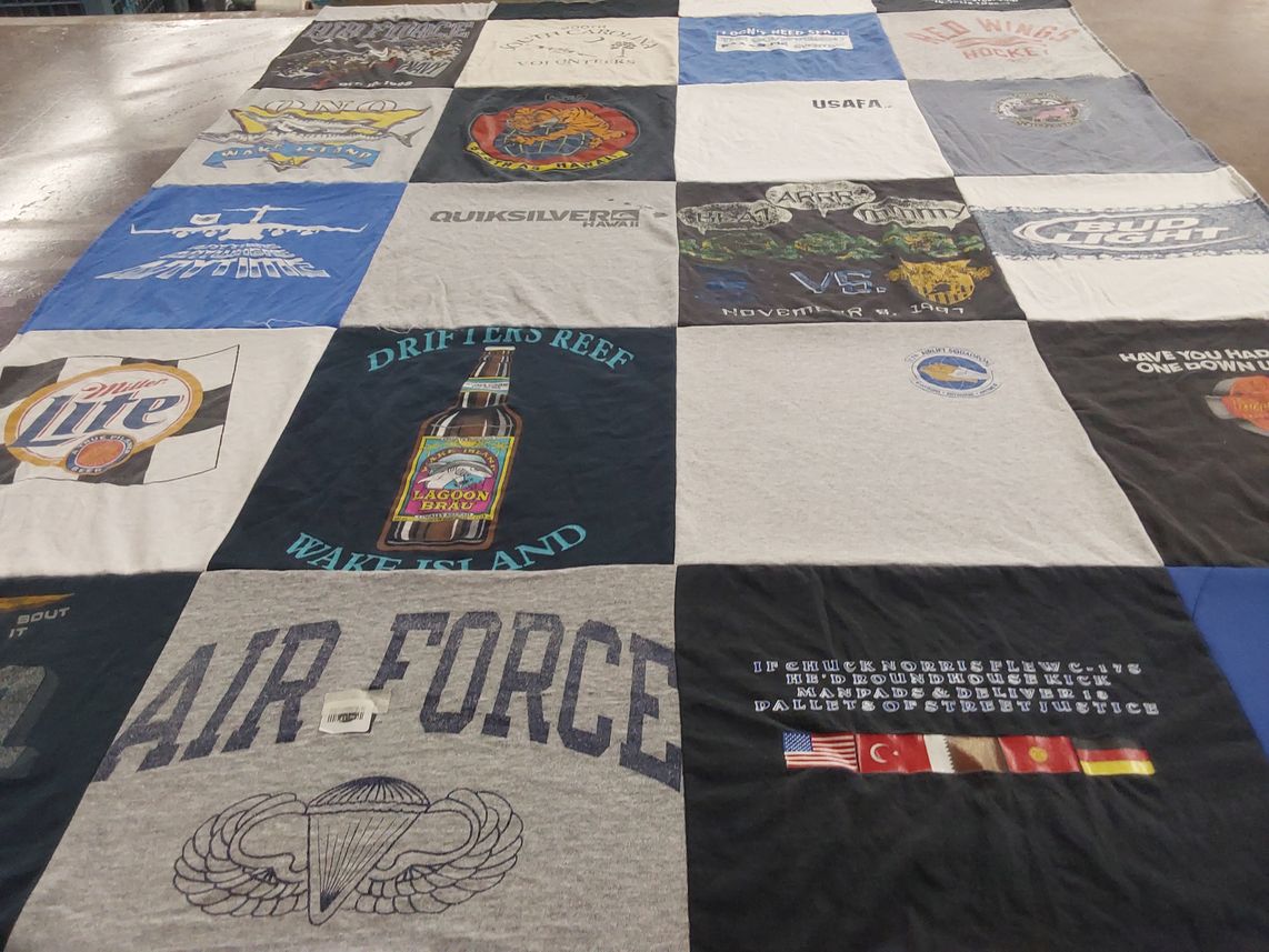 T-shirt quilt featuring red wings hockey by JOHN from SC