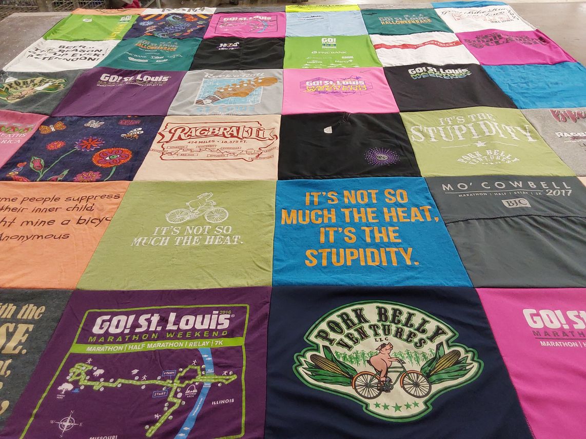 T-shirt quilt with running, biking themes by shelly from WI