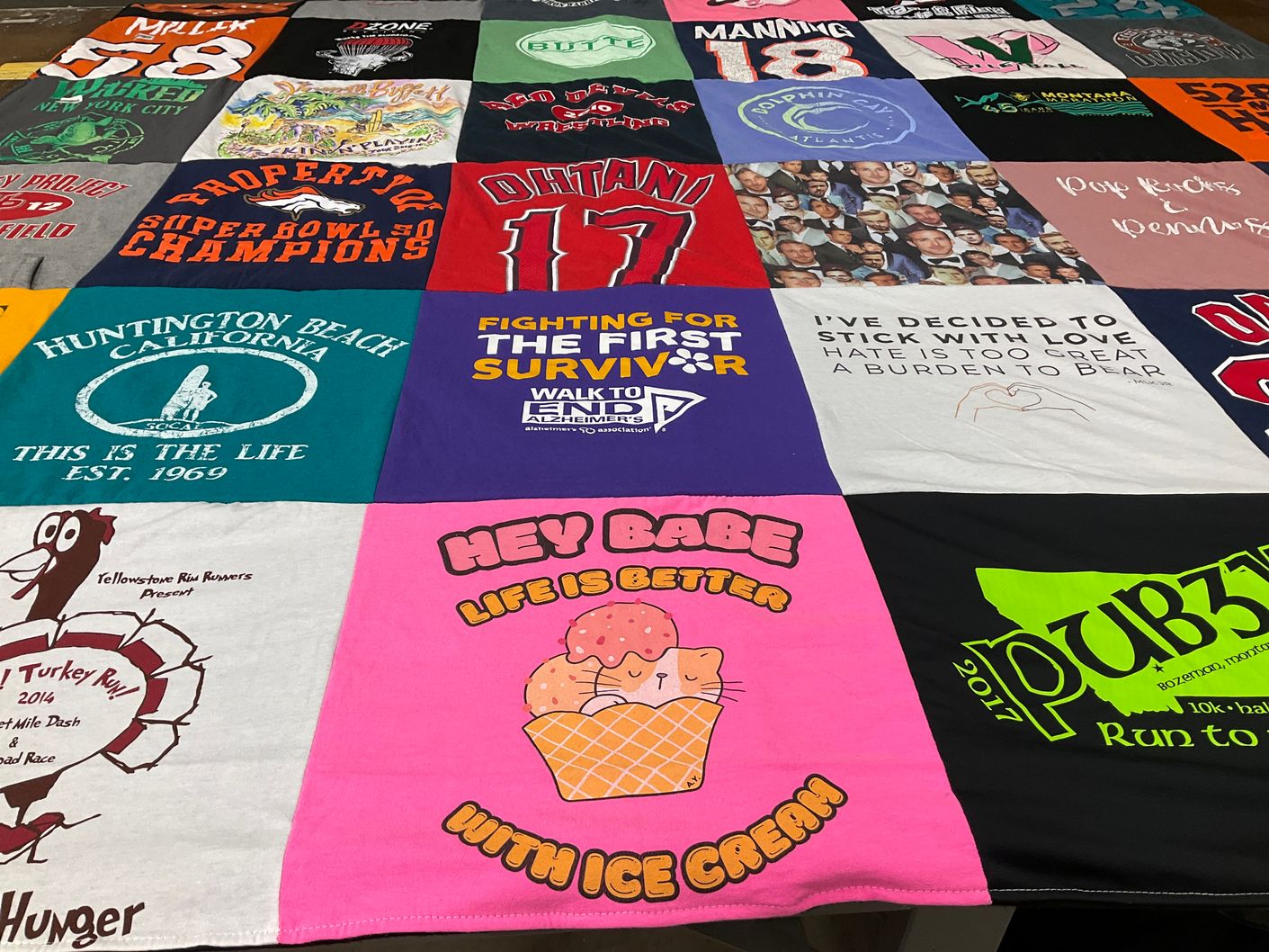 T-shirt quilt with running, surfing themes by Taylor from MT