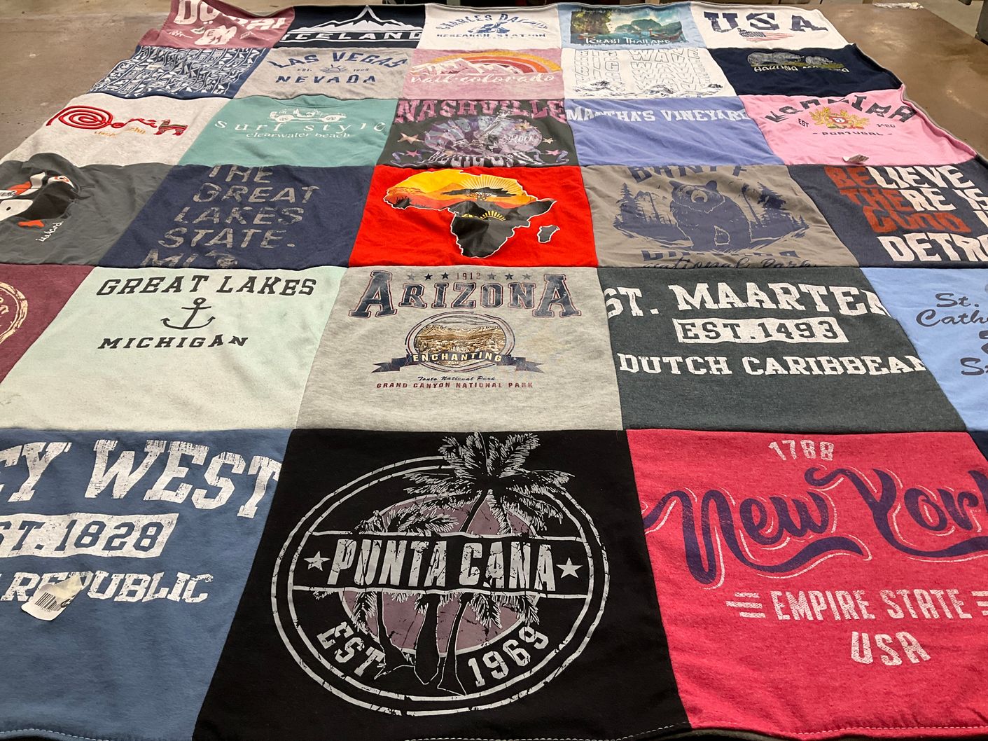 T-shirt quilt with travel, geography themes by Agnes from FL