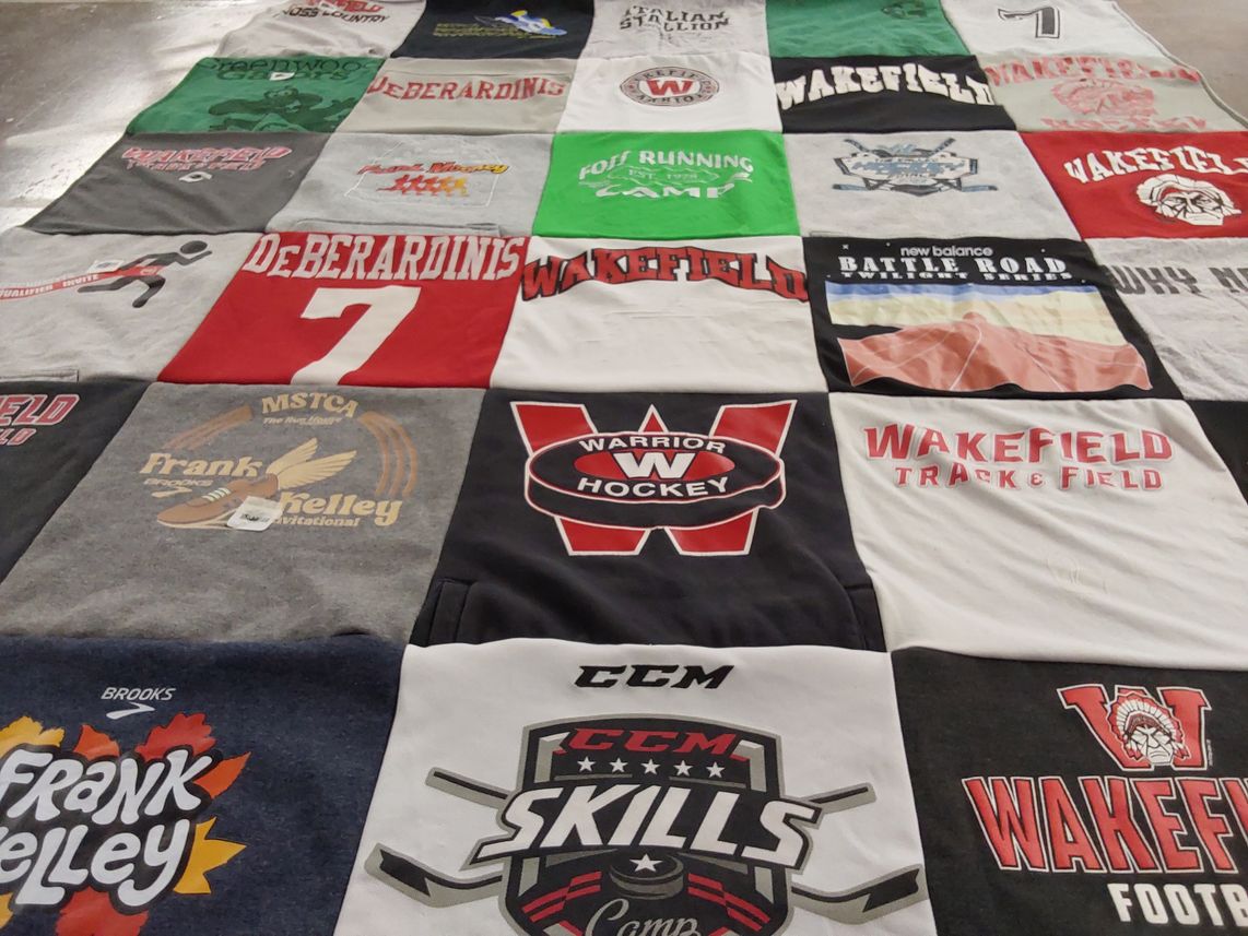 T-shirt quilt featuring wakefield high school hockey, wakefield high school track and field by Tiffany from MA