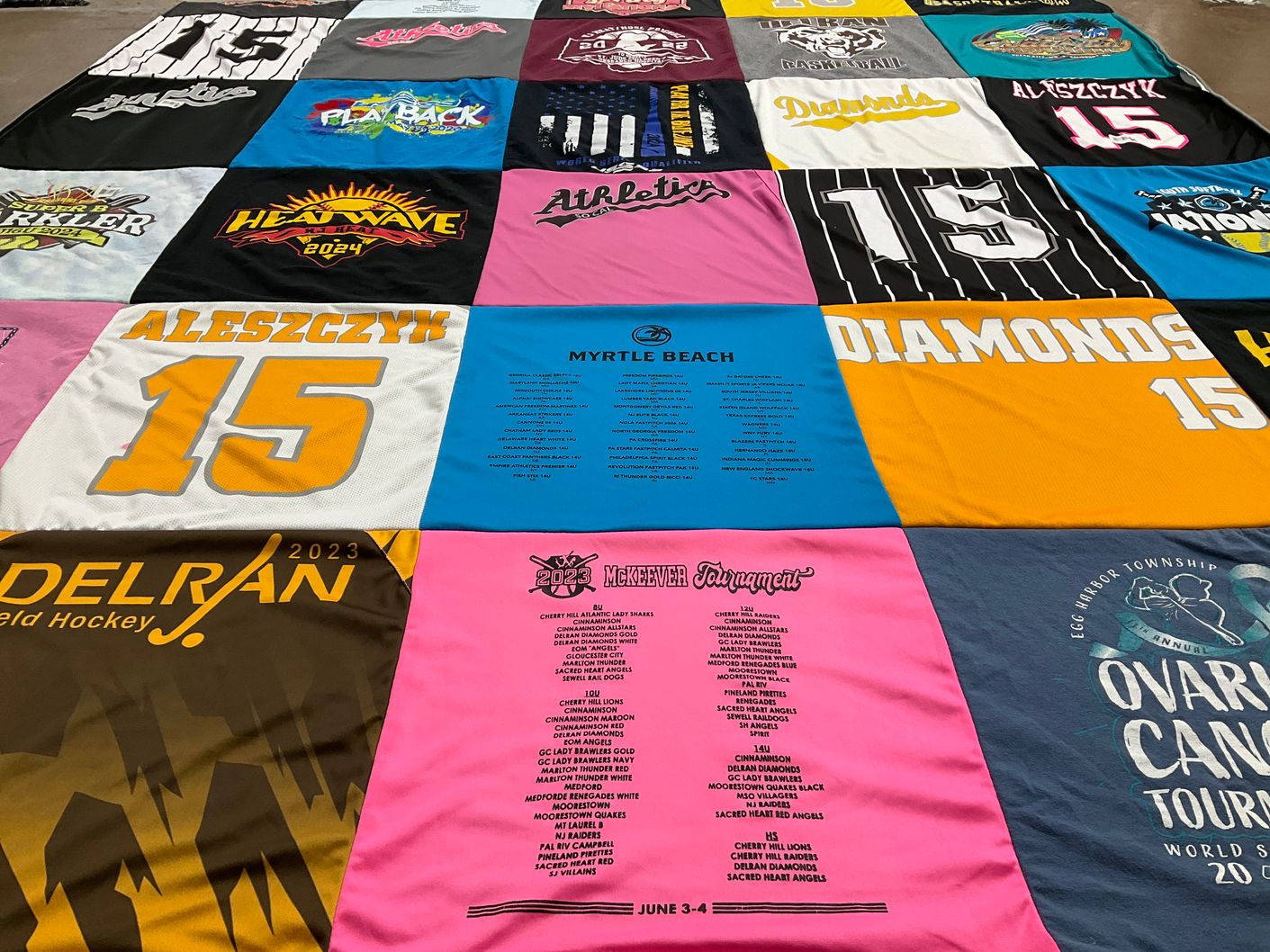 T-shirt quilt with sports, hockey themes by Tracy from NJ