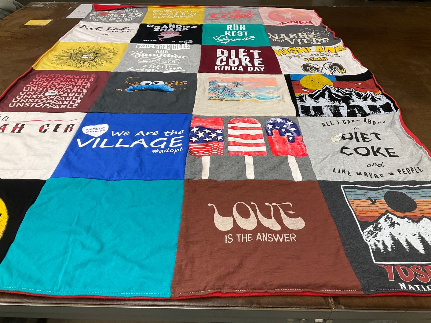 T-shirt quilt with adoption, cooking themes by Laurie from CA