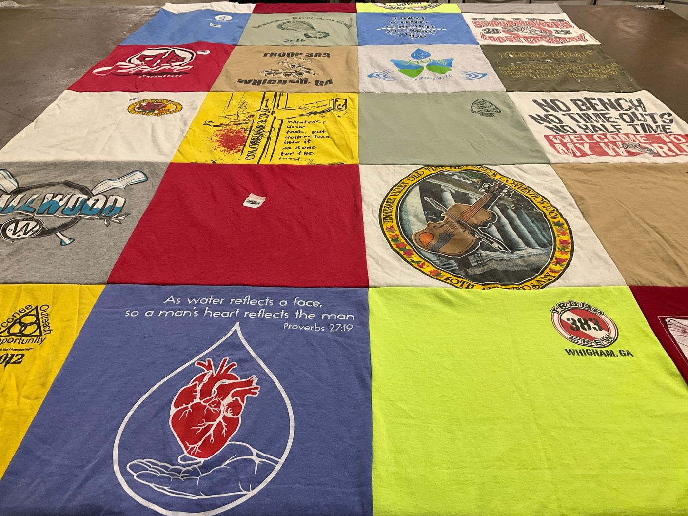T-shirt quilt with community, outreach themes by Nadia from GA