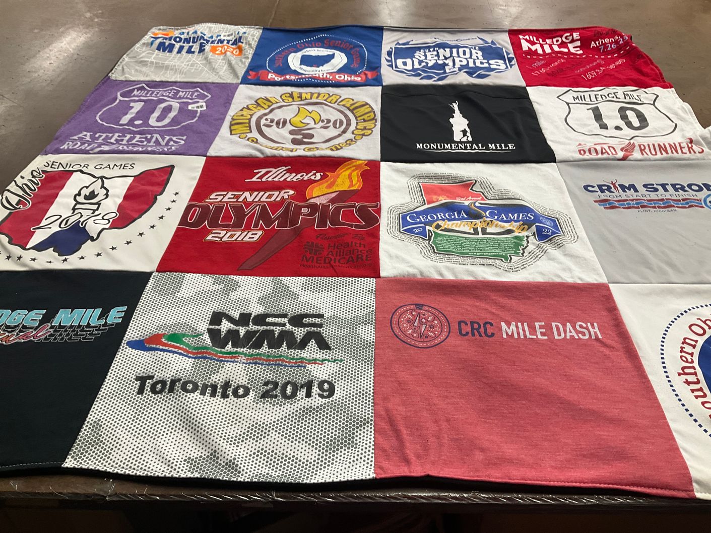 T-shirt quilt with running, fitness themes by David from GA