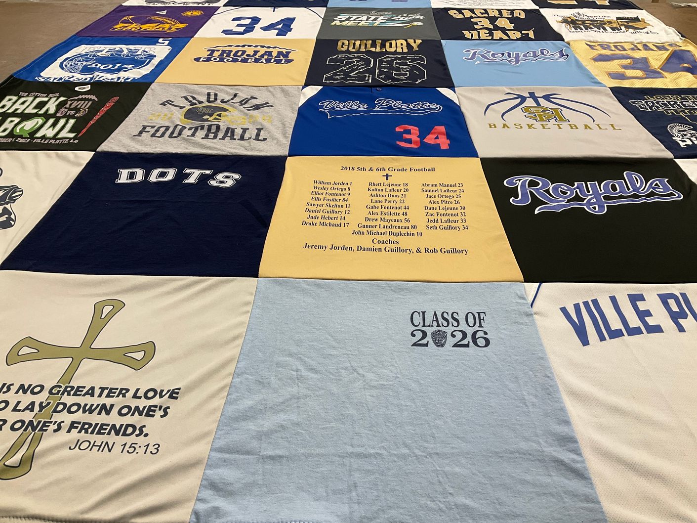 T-shirt quilt featuring sacred heart basketball, trojan football by Jamie from LA
