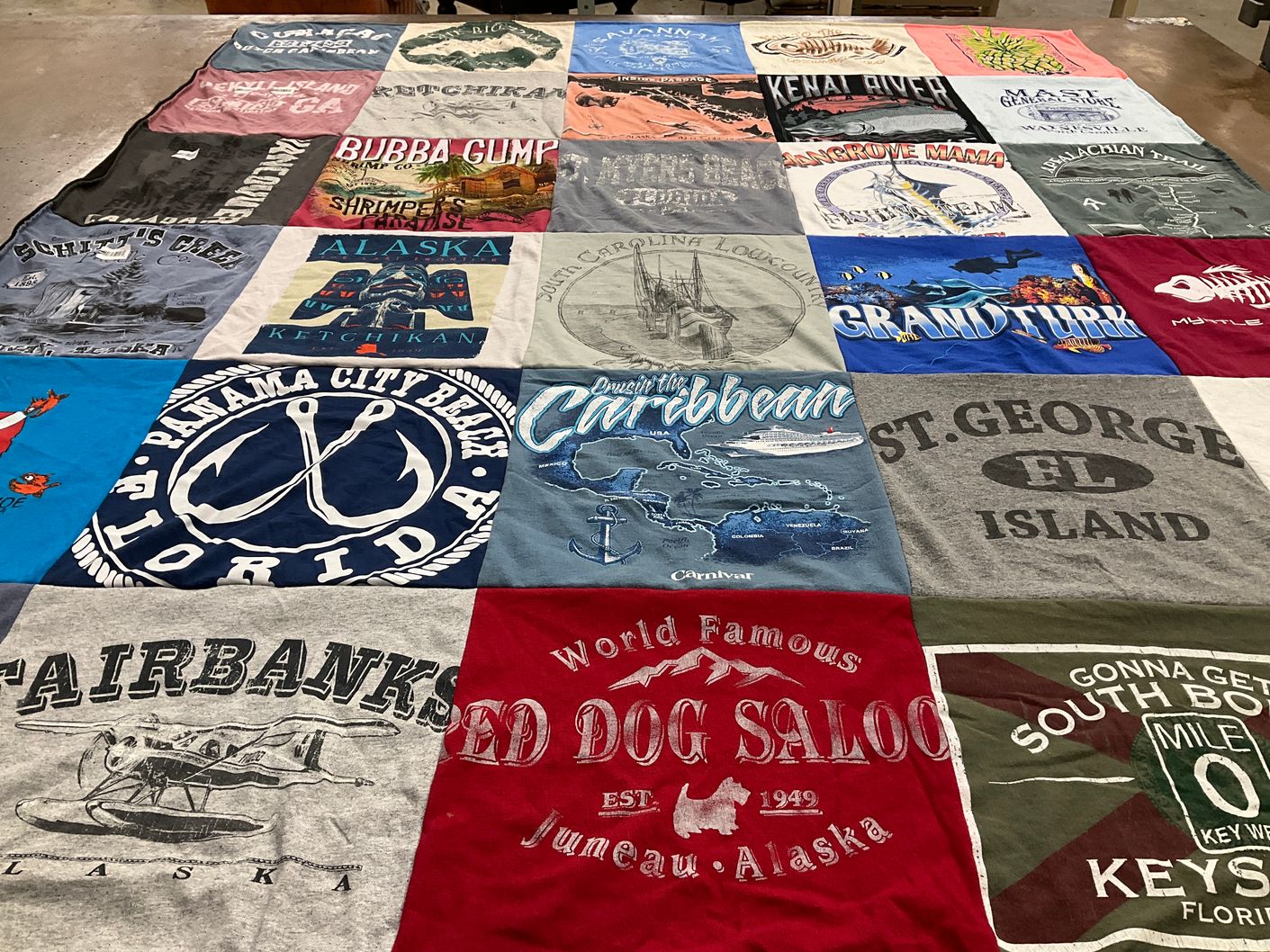 T-shirt quilt with travel, fishing themes by Alice from GA