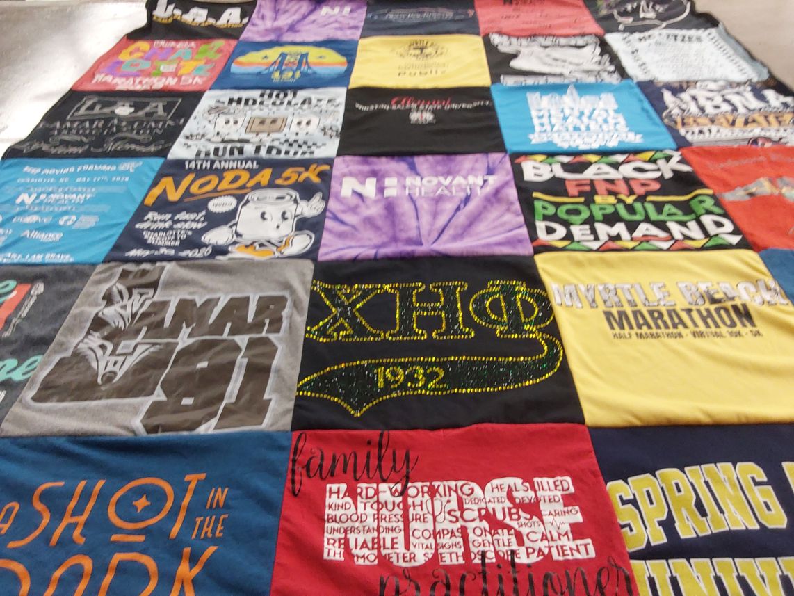 T-shirt quilt with running, community themes by Carolyn from NC