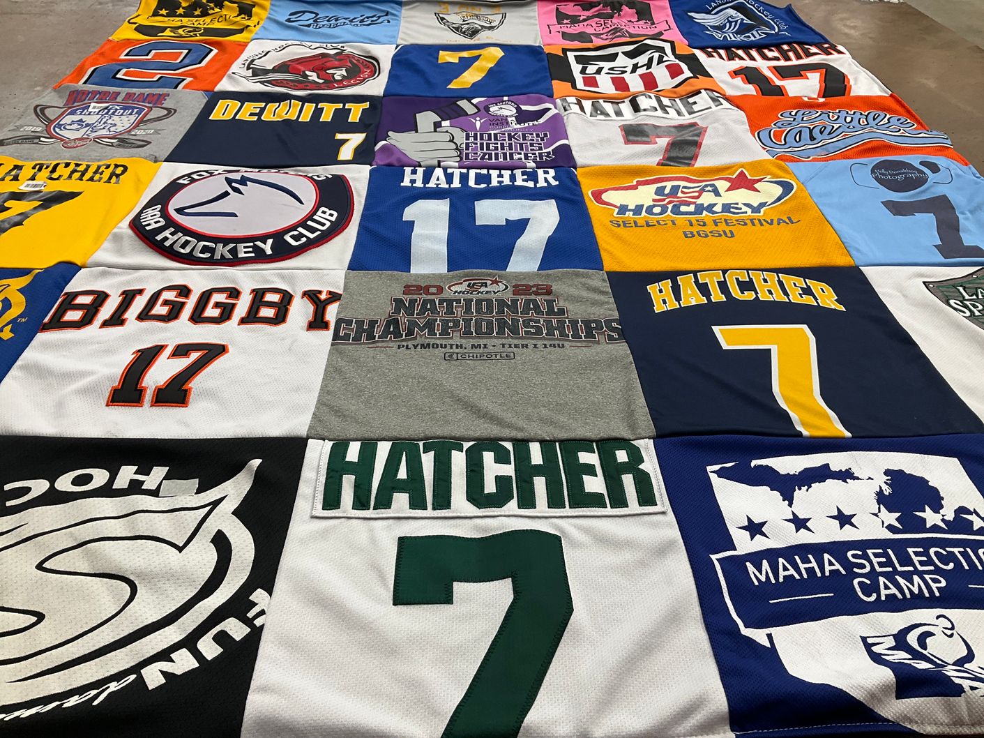 T-shirt quilt with hockey themes by Carrie from MI