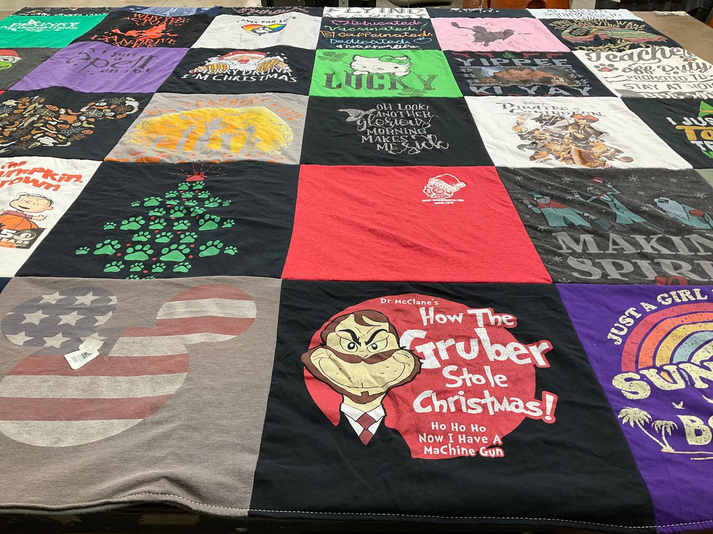 T-shirt quilt with christmas, movies themes by Kristin from MA