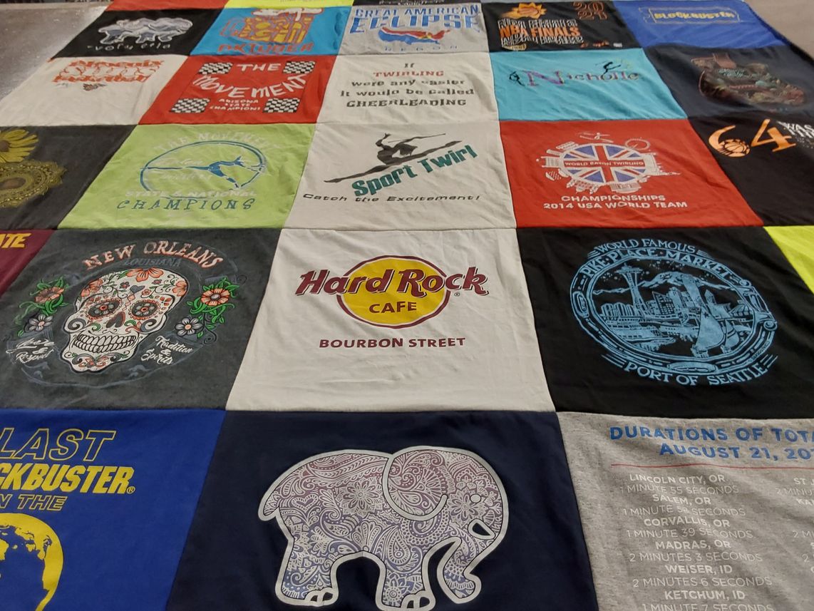 T-shirt quilt with food, travel themes by Liliane from AZ