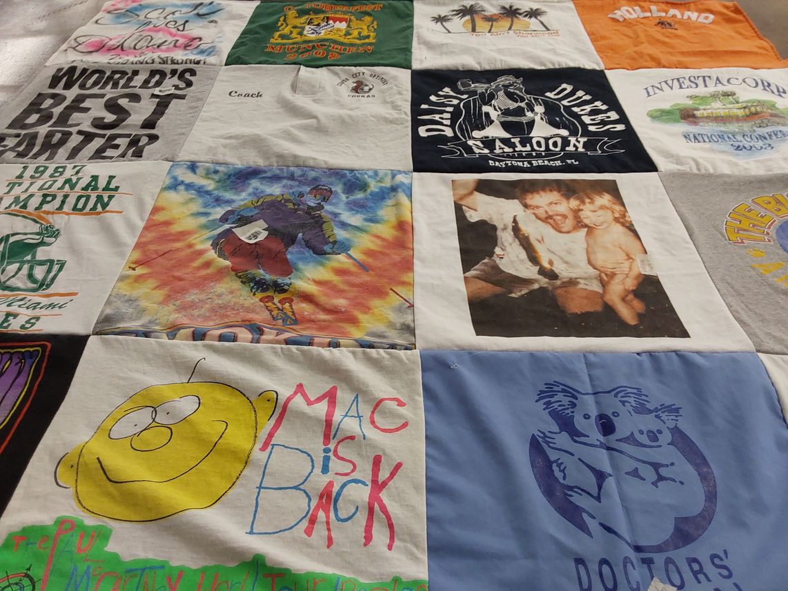 T-shirt quilt with family, sports themes by Diane from FL