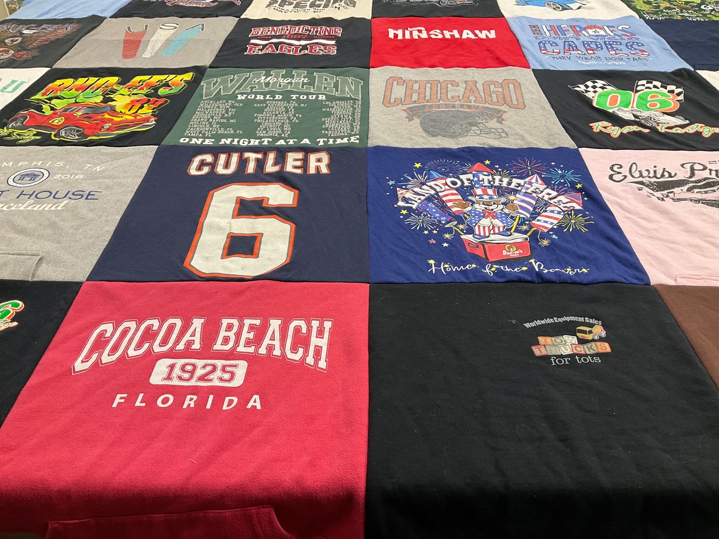 T-shirt quilt with travel, music themes by Hailie from IL