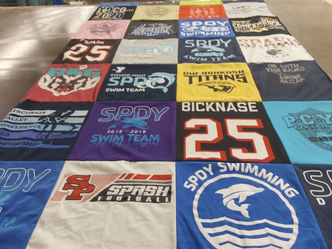 T-shirt quilt featuring spdy swim team, splash football by Jenny from WI