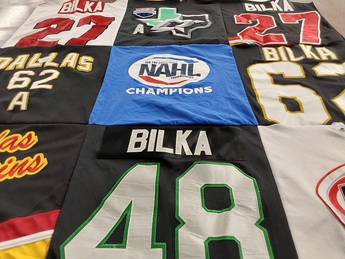 T-shirt quilt with hockey themes by Patricia from TX