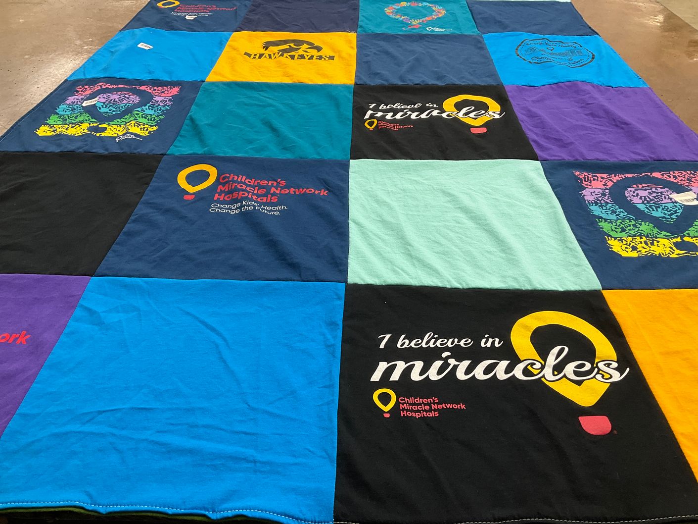 T-shirt quilt with charity, health themes by Joanne from IA