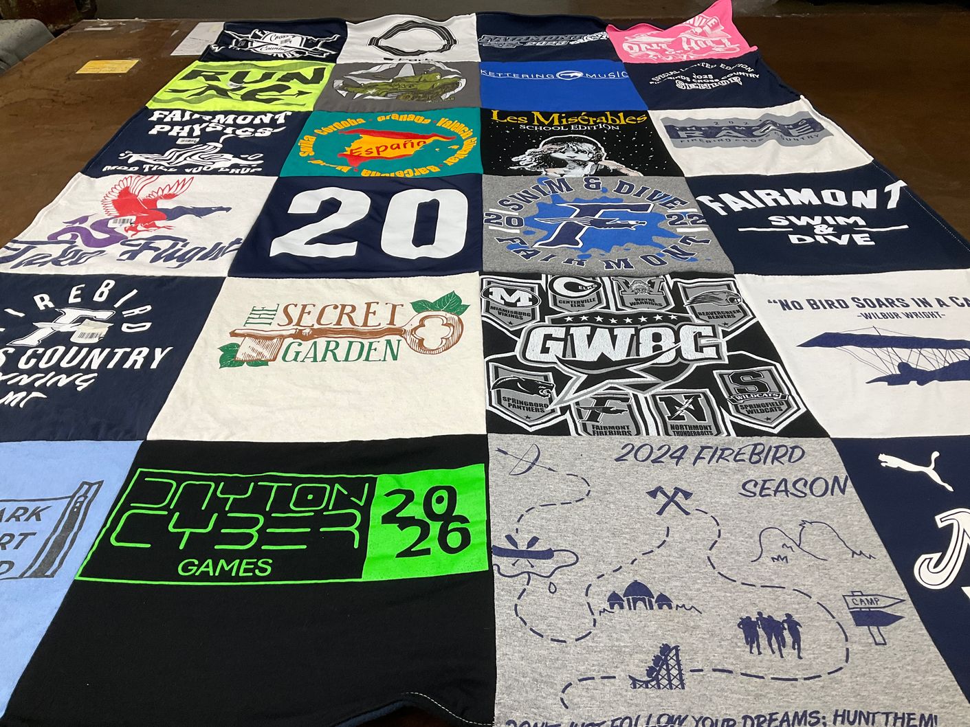 T-shirt quilt featuring firebird swim team, firebird country team by Trina from OH