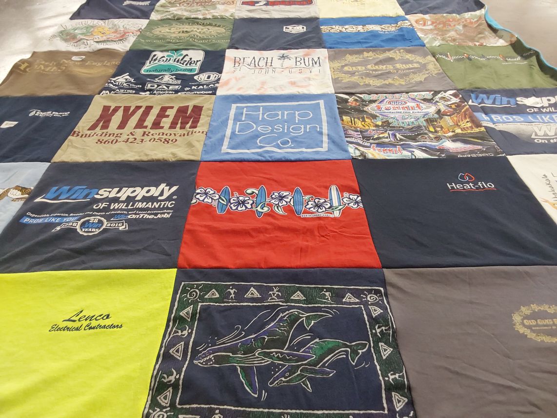 T-shirt quilt with construction, home improvement themes by Hope from CT