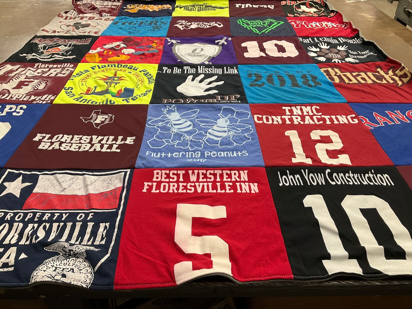 T-shirt quilt featuring floresville baseball team by Roxanne from TX