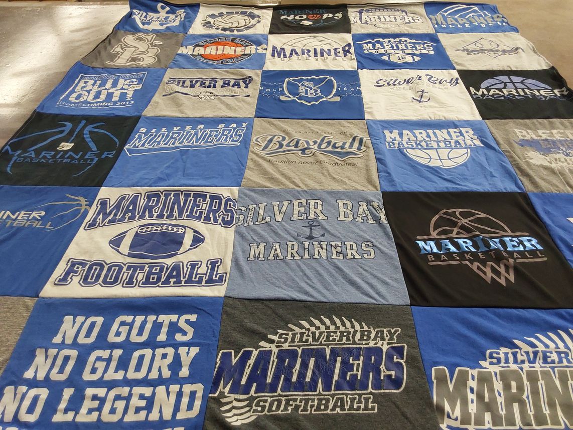 T-shirt quilt featuring silver bay mariners football, silver bay mariners basketball by Kelly from MN