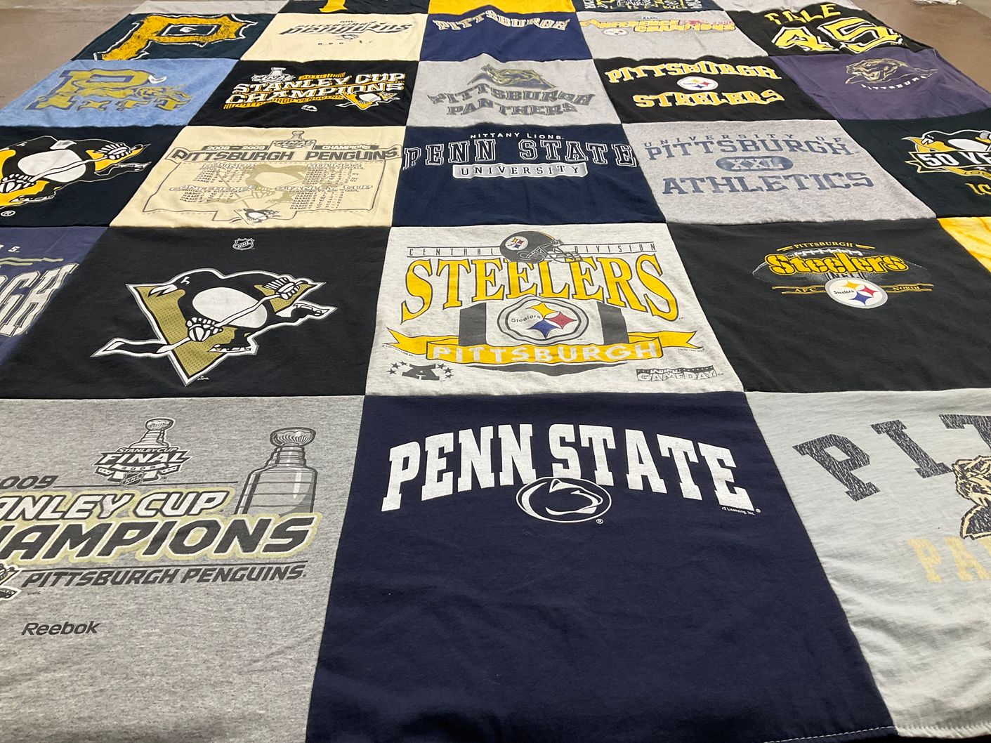 T-shirt quilt featuring pittsburgh steelers, pittsburgh penguins by Thomas from PA