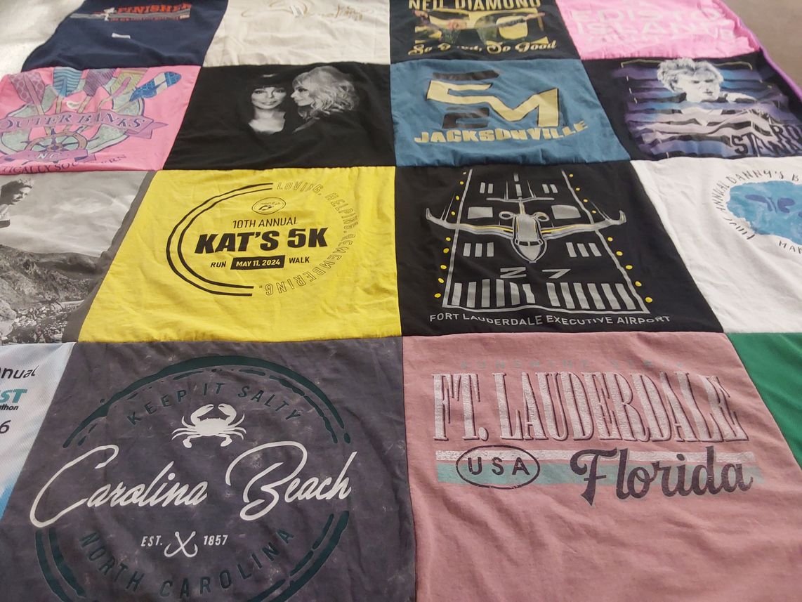 T-shirt quilt with running, beach activities themes by Shelly from PA