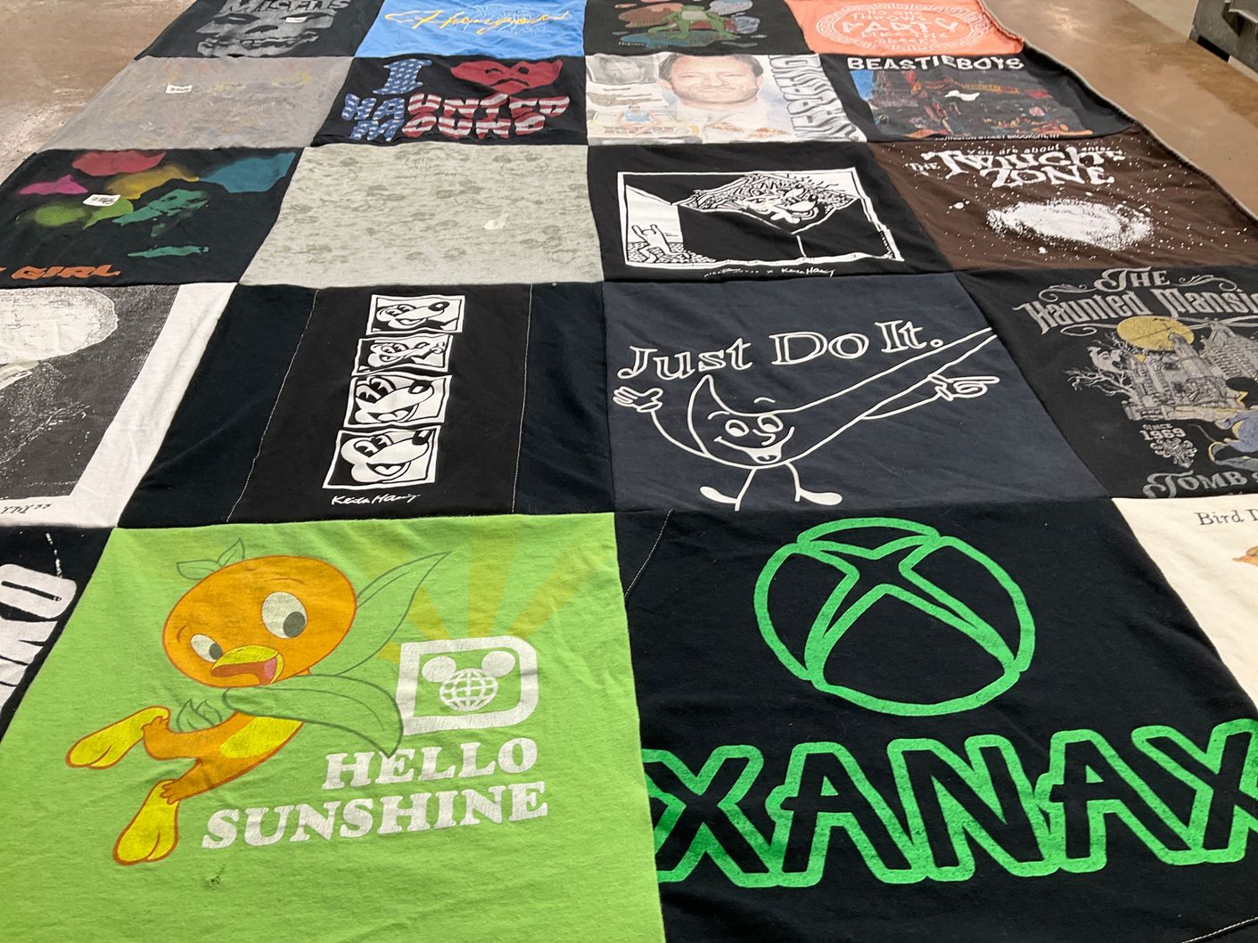T-shirt quilt with music, gaming themes by Lolly from OK