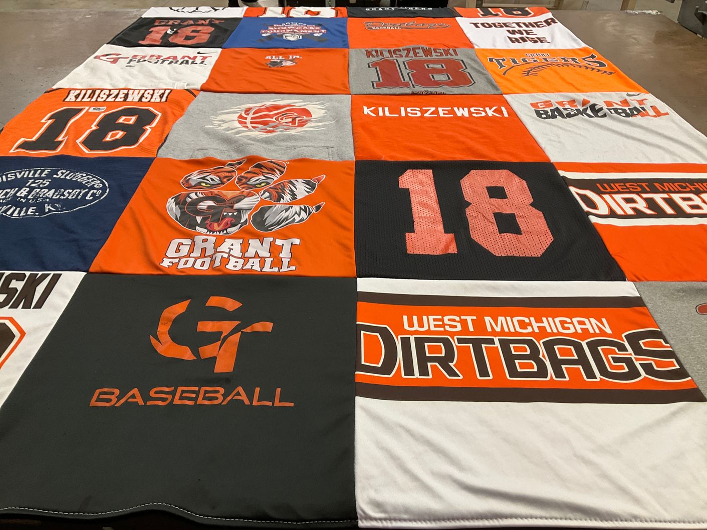 T-shirt quilt featuring grant football, west michigan dirtbags by Jennifer from MI