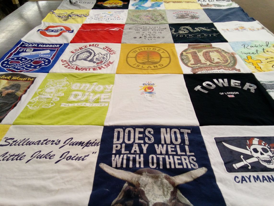 T-shirt quilt with diving, travel themes by Amy from TX