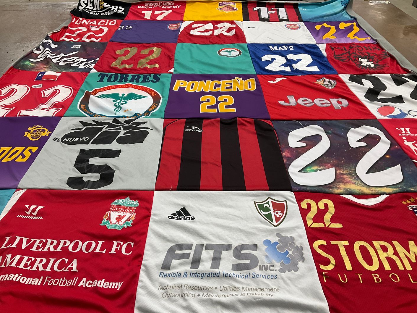 T-shirt quilt with soccer, football themes by Tacia from FL