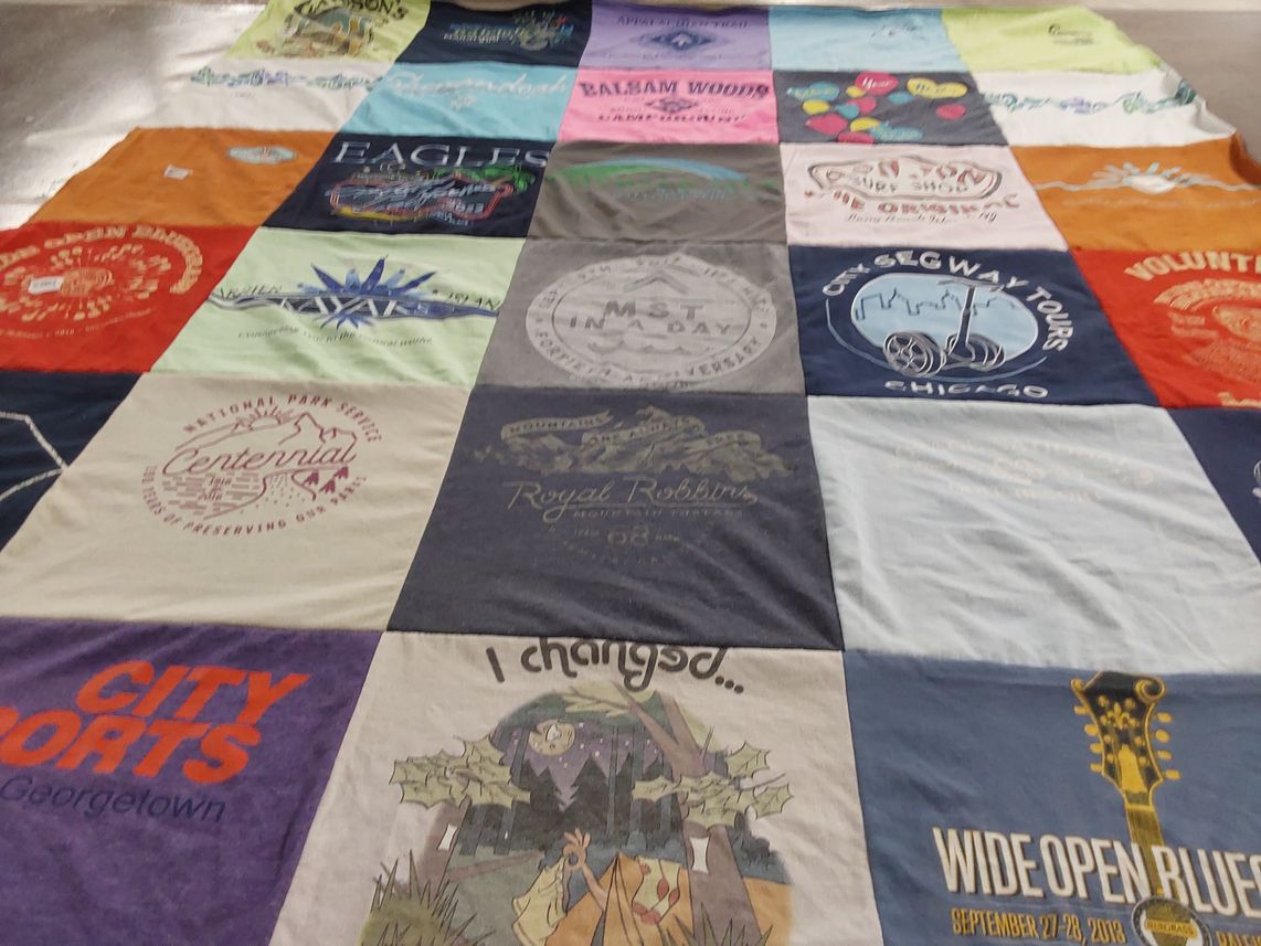 T-shirt quilt with travel, outdoors themes by Susan from NC
