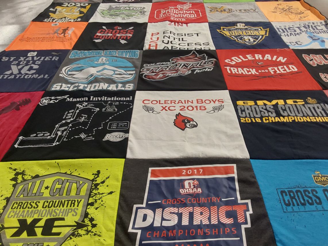 T-shirt quilt featuring colerain boys cross country team, st xavier cross country team by Briana from OH