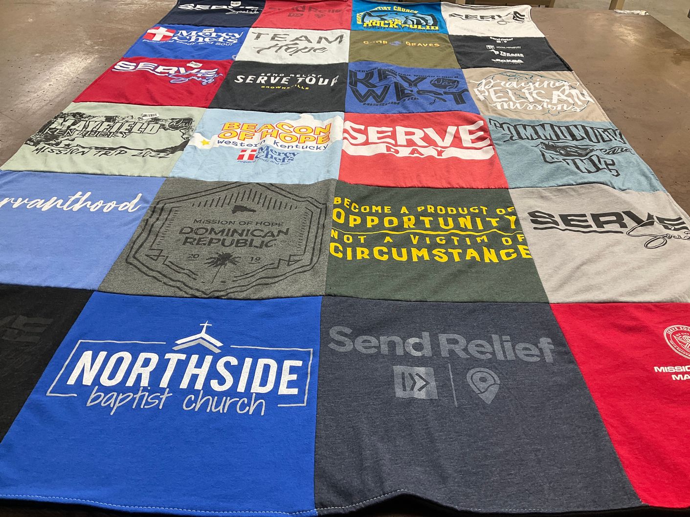 T-shirt quilt with community service, mission trips themes by Devon from OK