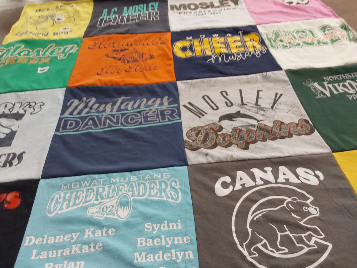 T-shirt quilt featuring mustangs, dolphins by Kim from FL
