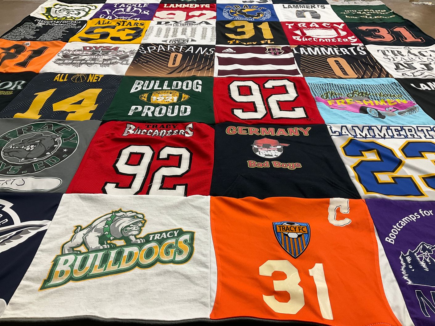 T-shirt quilt featuring tracy buccaneers, tracy bulldogs by Janell from CA