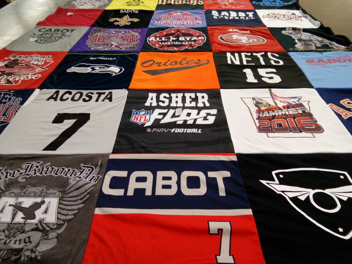 T-shirt quilt featuring new orleans saints, baltimore orioles by Amy from AR