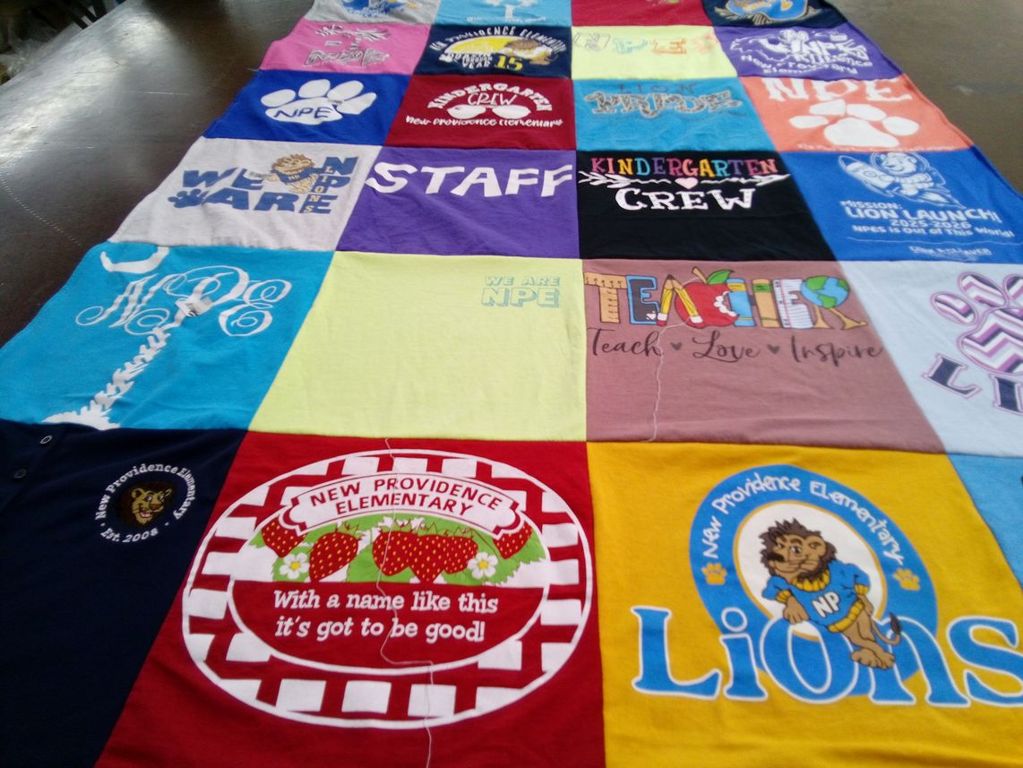 T-shirt quilt featuring new providence elementary school lions by Haley from SC