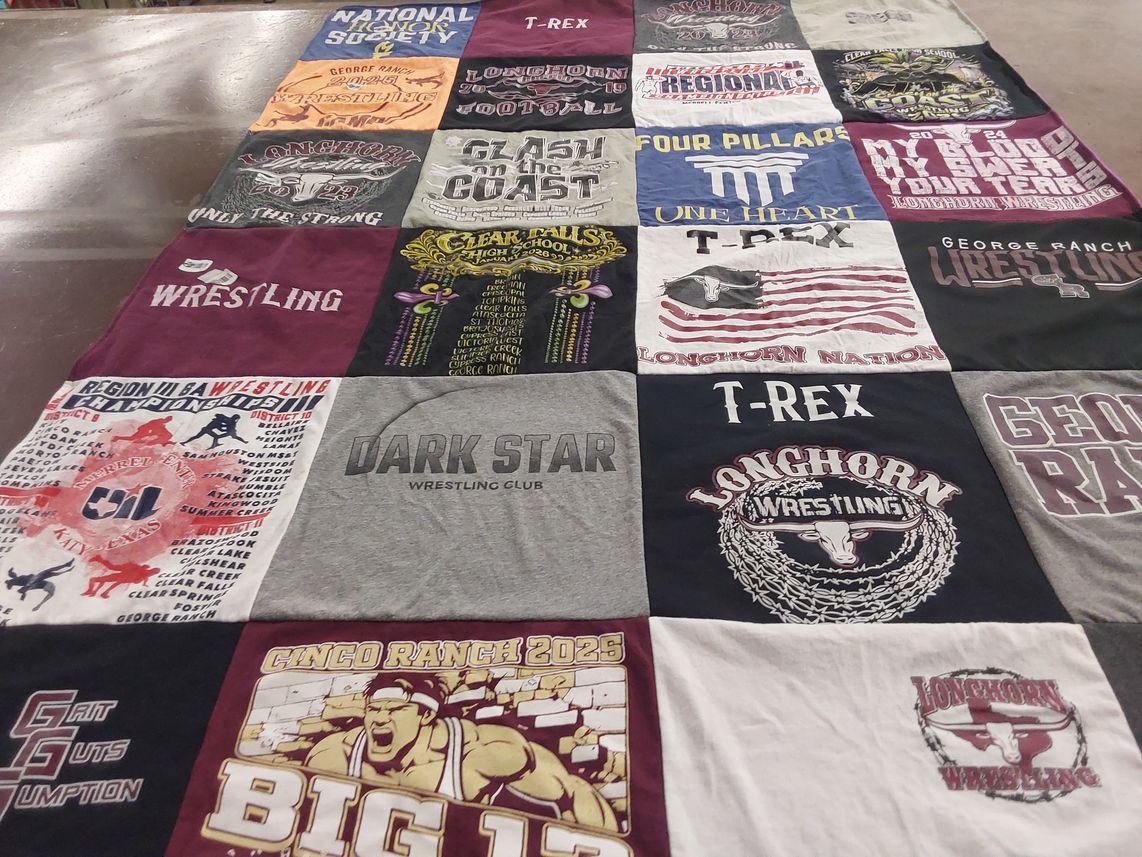 T-shirt quilt featuring longhorn wrestling by Taylor from TX
