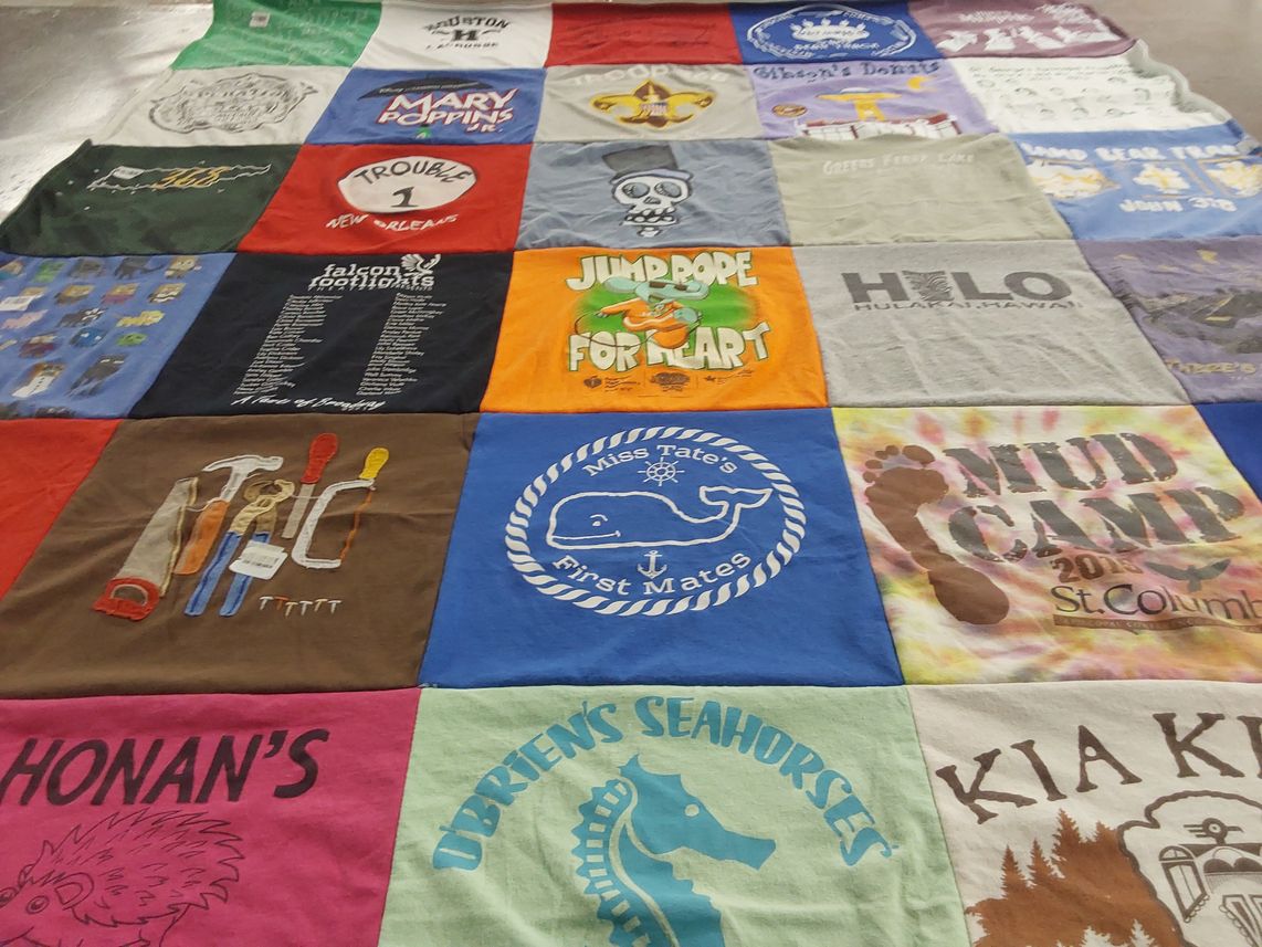 T-shirt quilt with camping, music themes by Gayle from TN