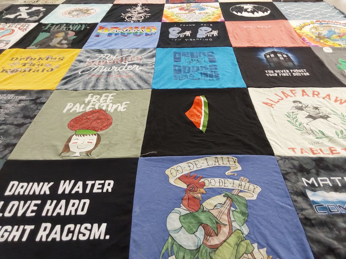 T-shirt quilt with activism, human rights themes by Karin from CO