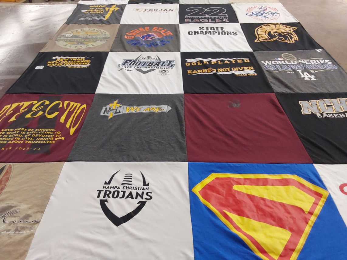 T-shirt quilt featuring nampa christian trojans by Erin from ID