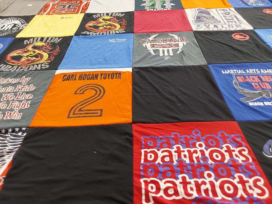 T-shirt quilt featuring caledonia high school football, millotn dragons by CIDEANIA K from FL