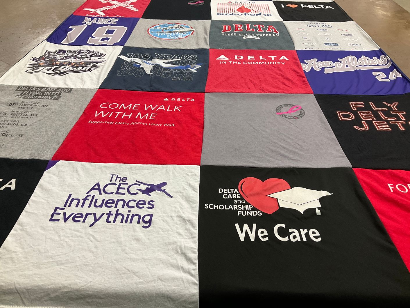 T-shirt quilt with community service, fundraising themes by Cheryl from GA
